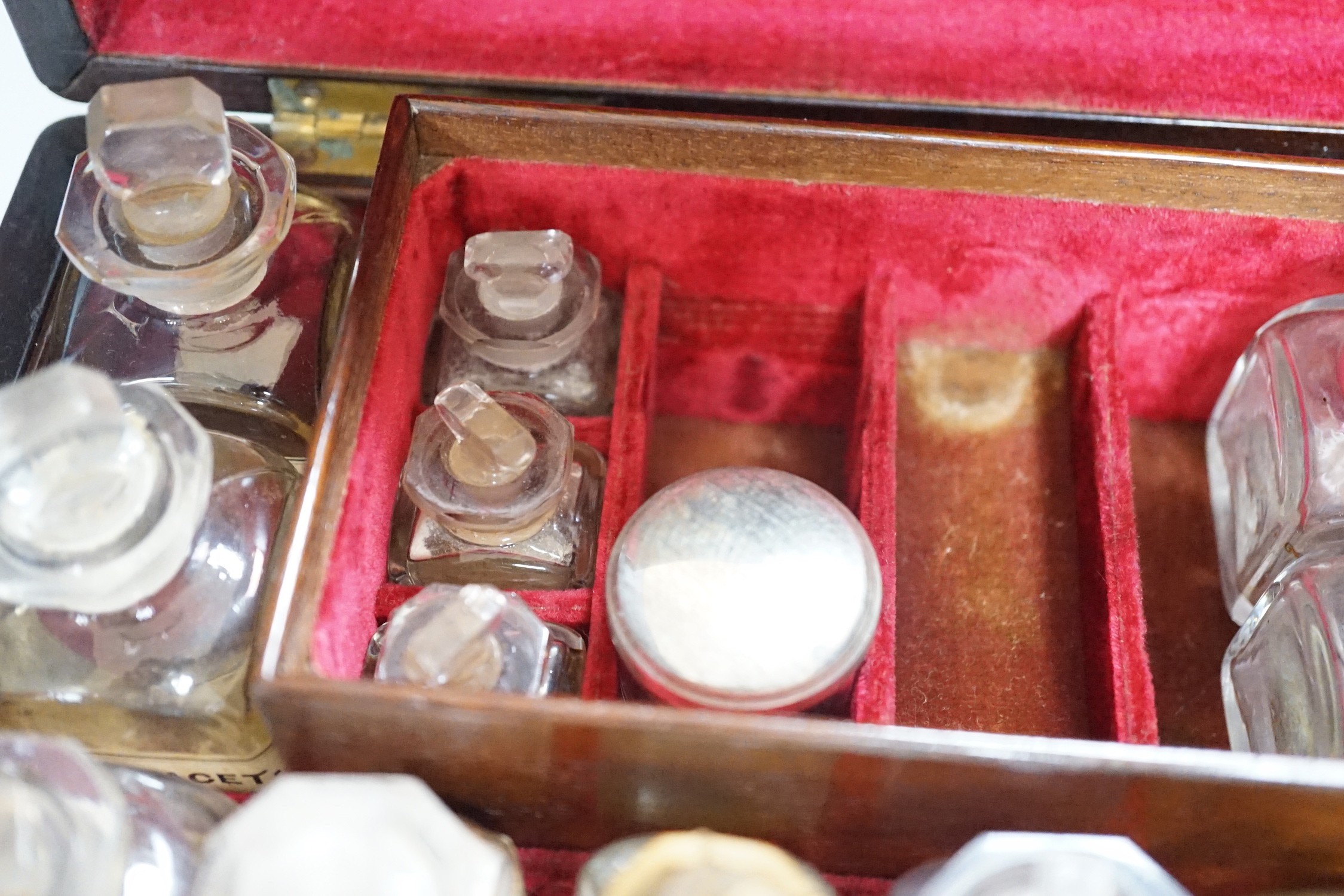 A 19th century mahogany cased travelling apothecary set with glass flasks, handle plate engraved ‘Dr.Tulk’, 26cm wide